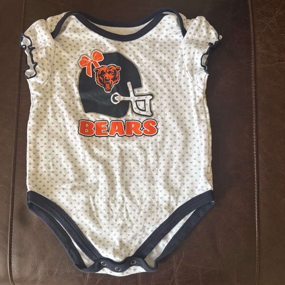 NWOT Baby Girl’s 18 month toddlers NFL Bears bodysuit w/snaps and team logo.